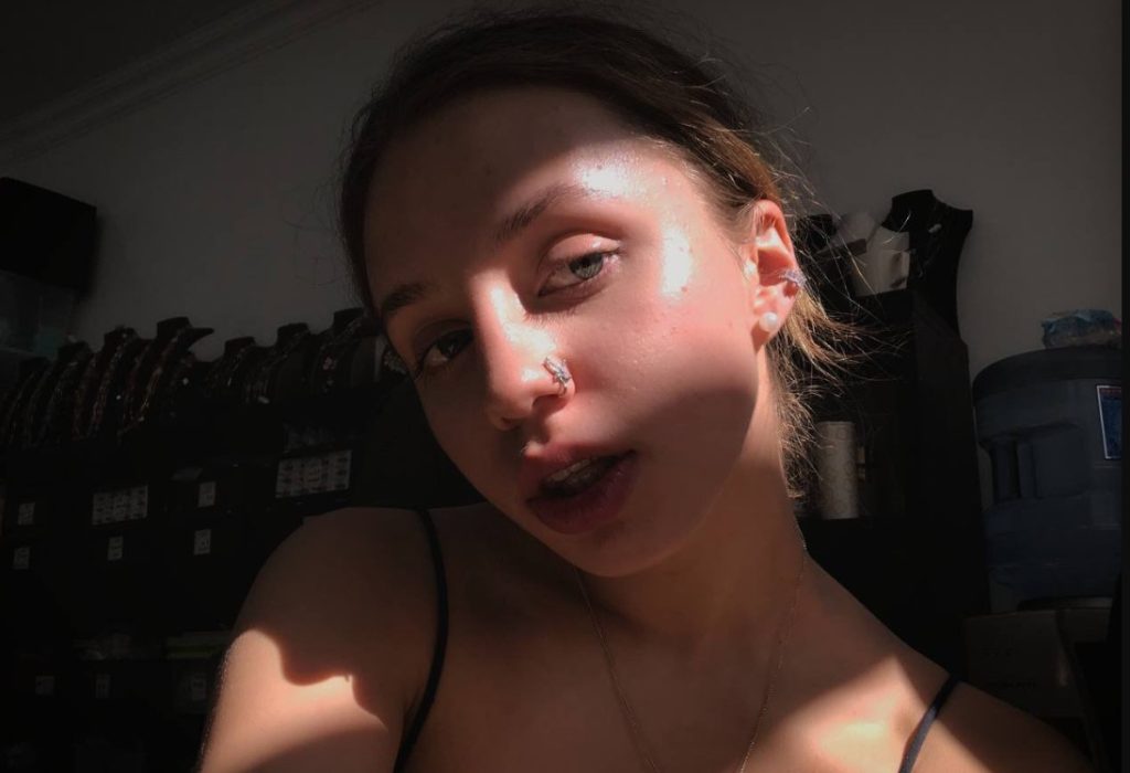 girl wearing Butterfly Nose Ring  