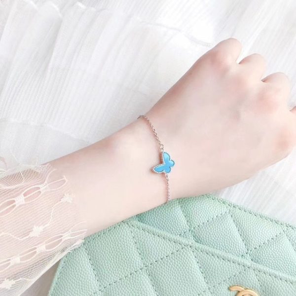 Turquoise Butterfly bracelets wearing on the twist